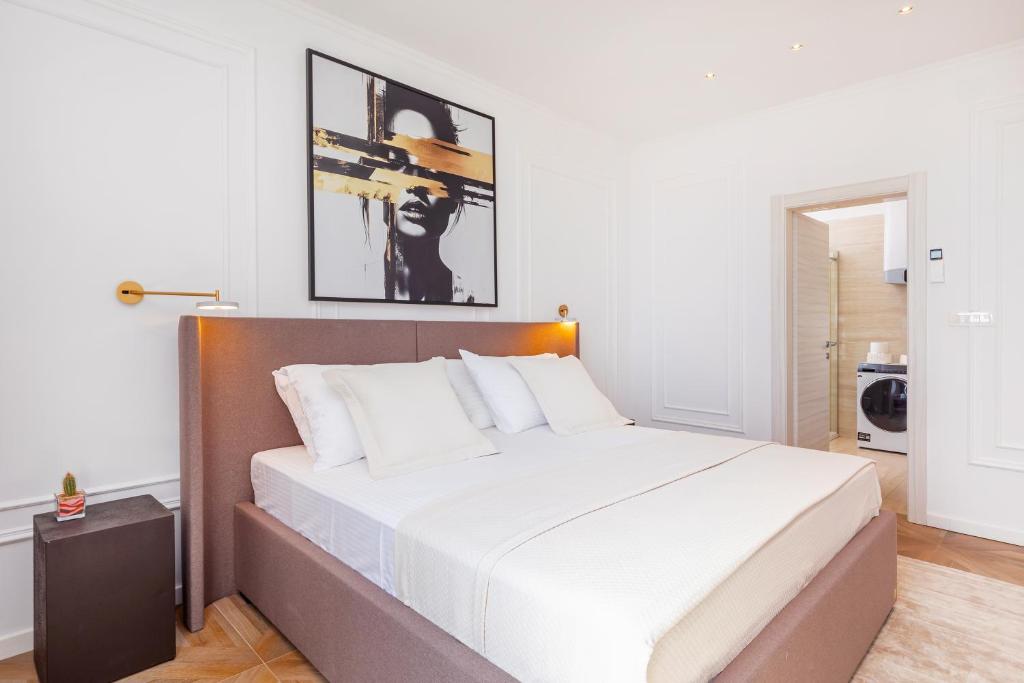 Postel nebo postele na pokoji v ubytování Ragusina luxury apartments