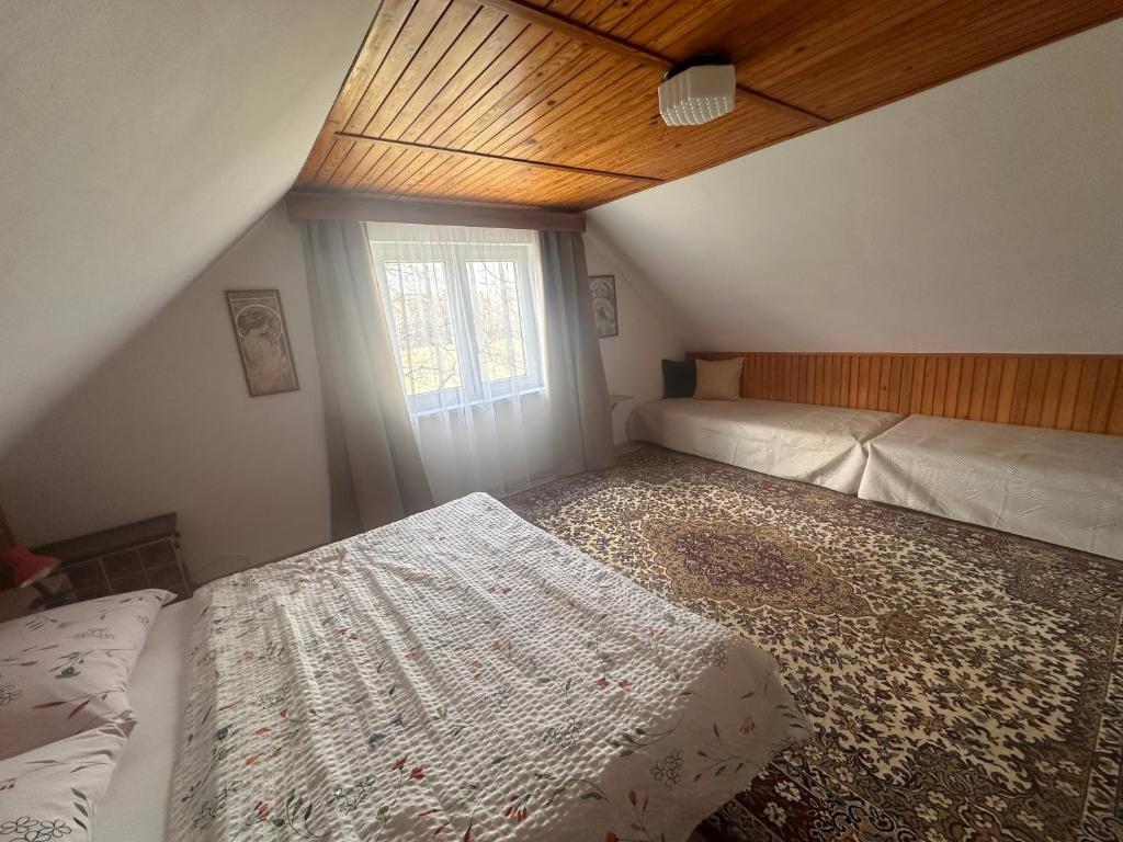 Postel nebo postele na pokoji v ubytování Ubytování u Přadků