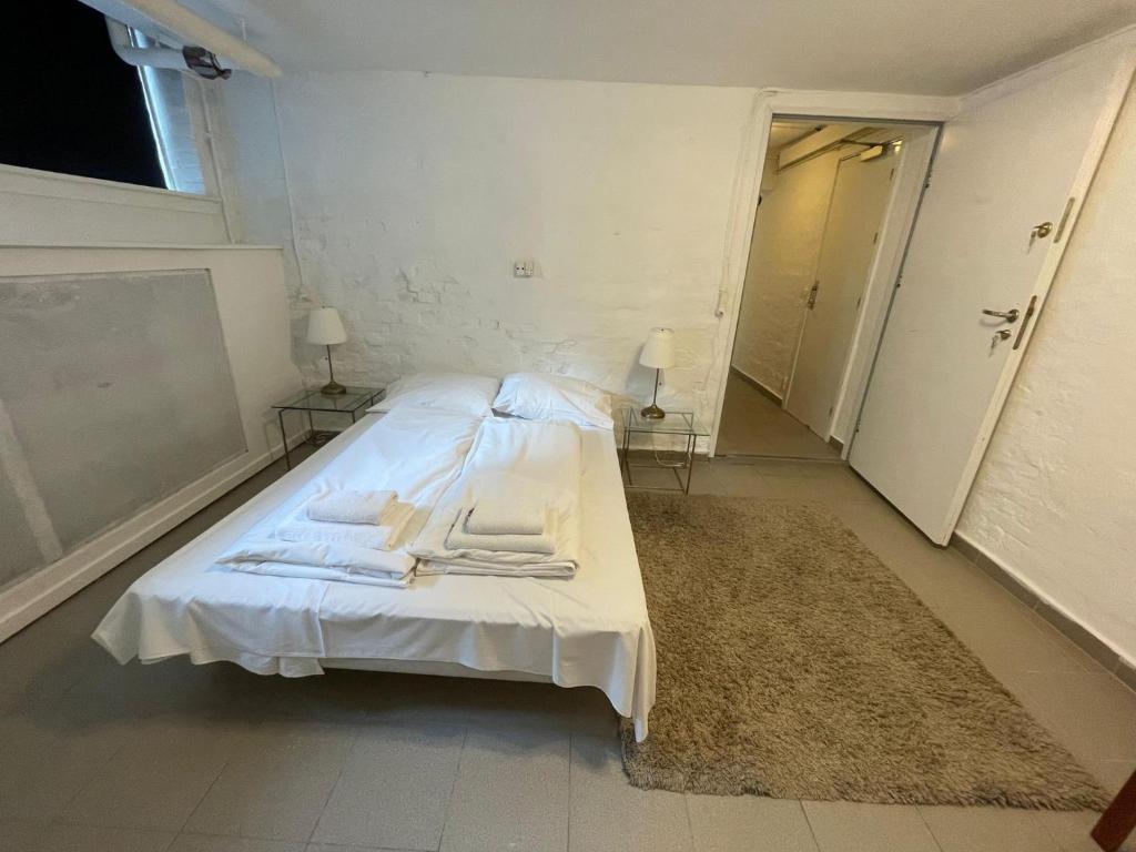 Postel nebo postele na pokoji v ubytování M18