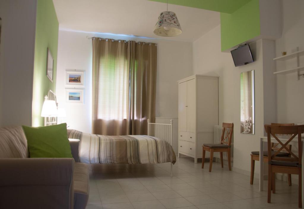 TV a/nebo společenská místnost v ubytování B&B Le Comari Salentine