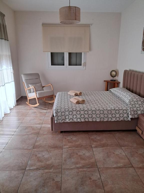 Łóżko lub łóżka w pokoju w obiekcie ILIANA.APARTMENTS