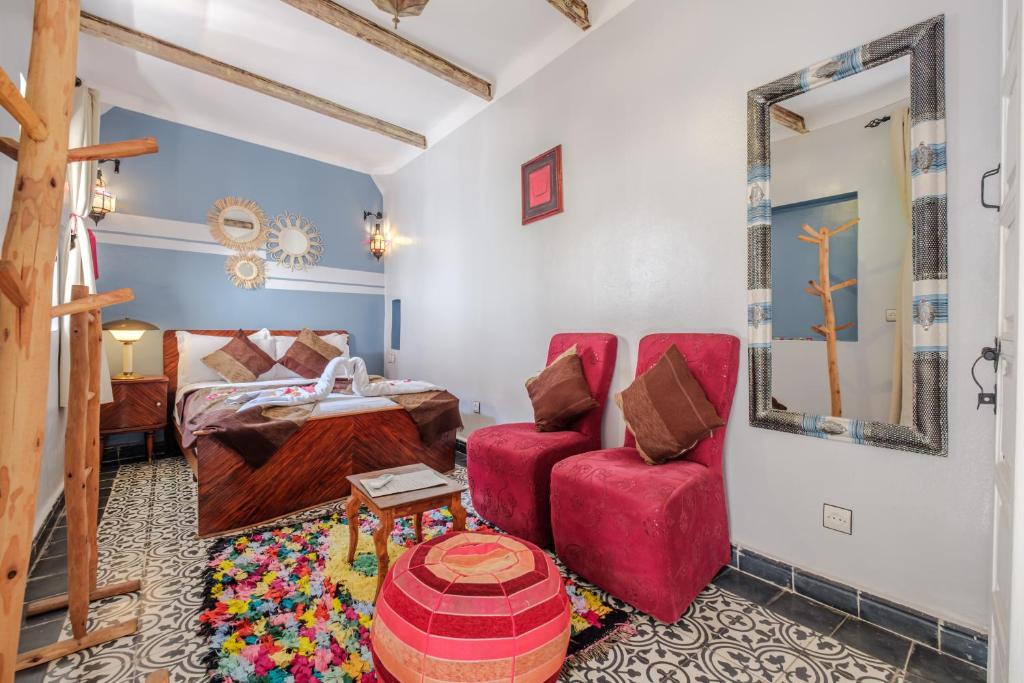 Postel nebo postele na pokoji v ubytování Riad Bobby Marrakech