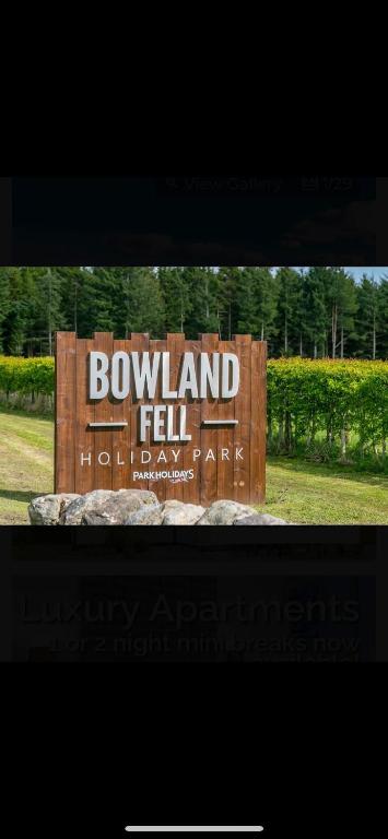 a sign for the bowland fell hudsonvelt park at Wensleydale 17 Caravan in Tosside