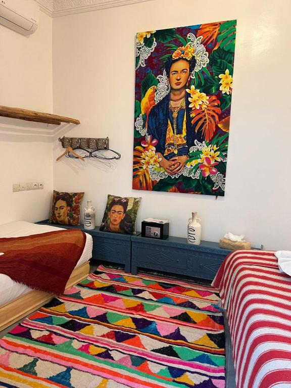 Postel nebo postele na pokoji v ubytování Riad EL BADI