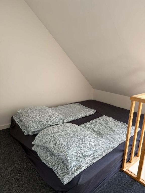 Postel nebo postele na pokoji v ubytování M18