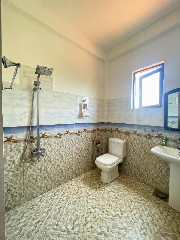 Koupelna v ubytování Curly Hostel Negombo