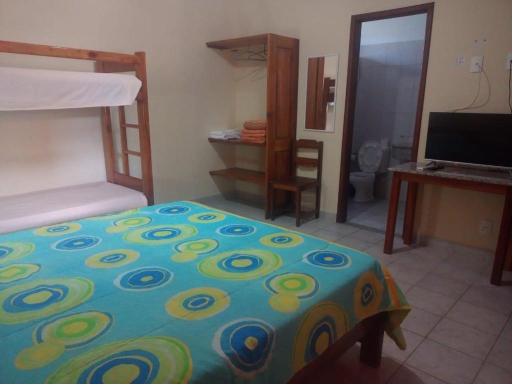 Postel nebo postele na pokoji v ubytování Hotel Patipe Canavieiras