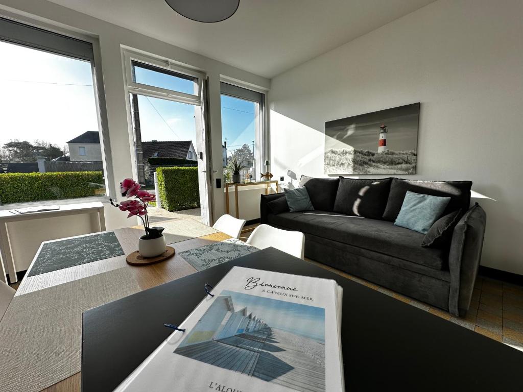 Posezení v ubytování À700m de la mer appartement avec terrasse, parking l'alouette