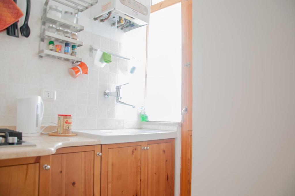 Kuchyň nebo kuchyňský kout v ubytování B&B Le Comari Salentine
