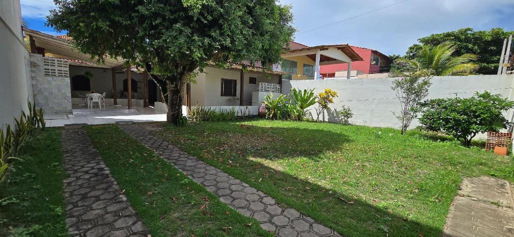 Taman di luar Casa Temporada Encanto do Mar