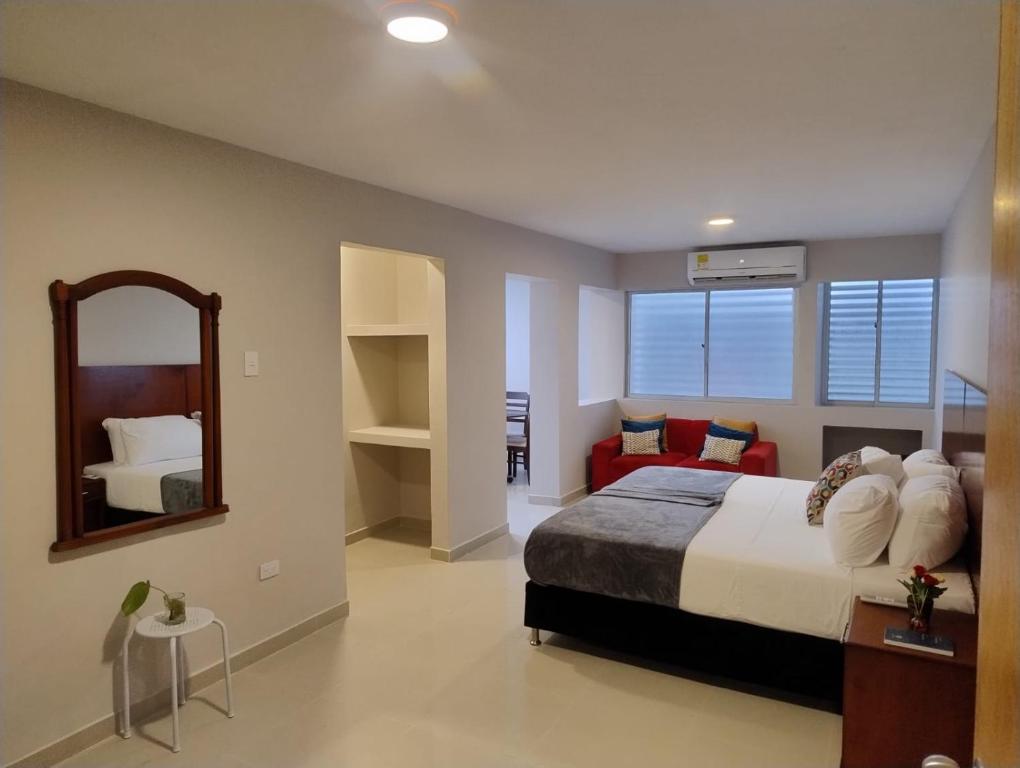 Voodi või voodid majutusasutuse Hotel Dorado Plaza Getsemaní toas