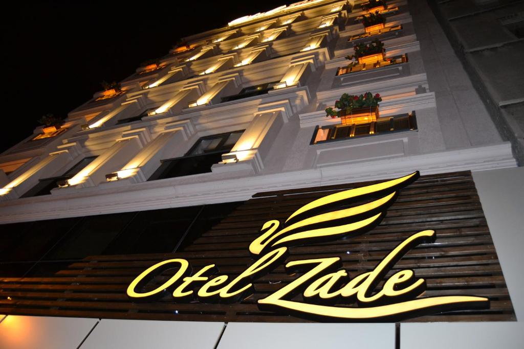 a close up of an oldtale sign in front of a building at Hotel Zade in Erzurum