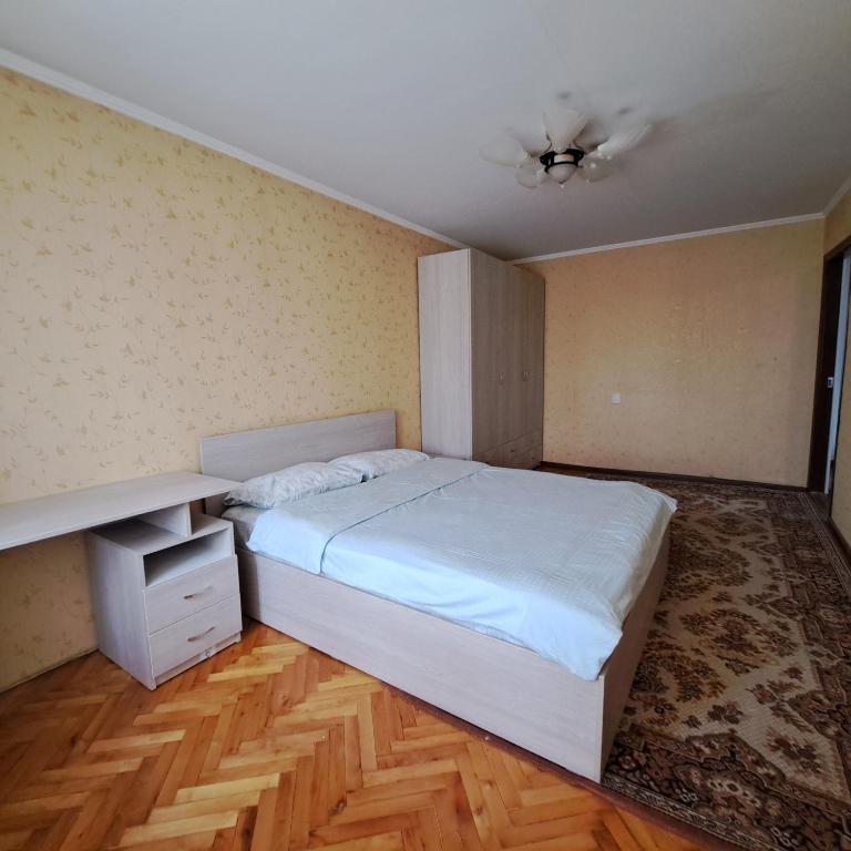 เตียงในห้องที่ Bănulescu Bodoni