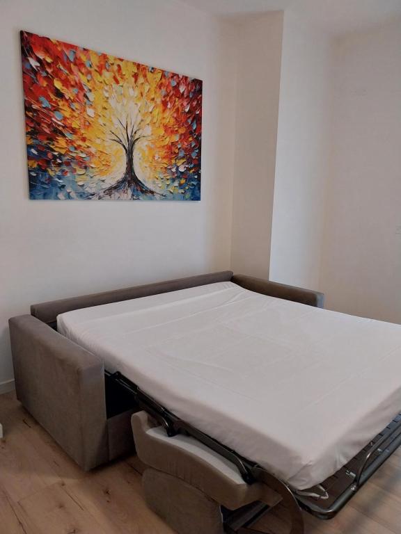 Postel nebo postele na pokoji v ubytování Via San Zeno Home