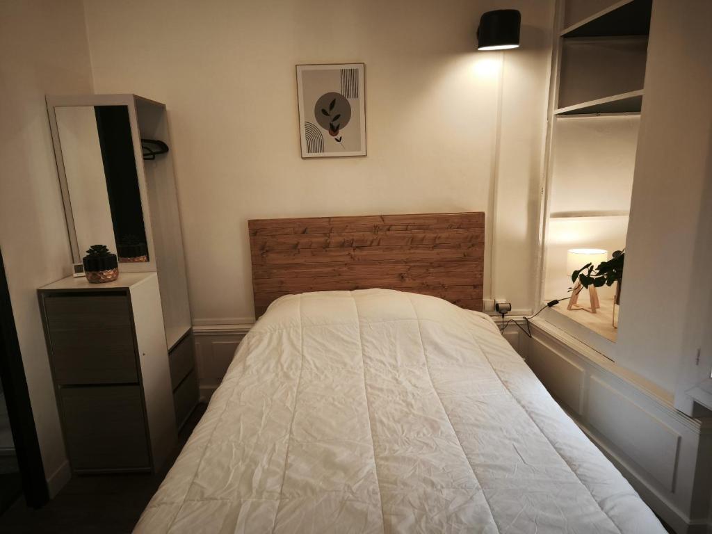 Voodi või voodid majutusasutuse LE PETIT PONTILLARD - Hypercentre - Face Opera & Parcs toas