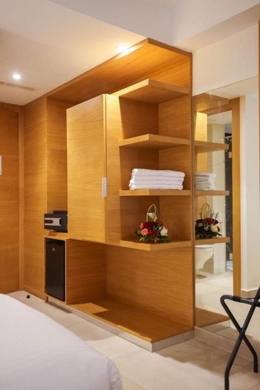 Kuchyň nebo kuchyňský kout v ubytování FAHO Hôtel