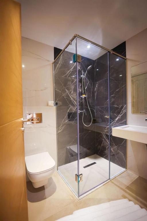 Koupelna v ubytování FAHO Hôtel