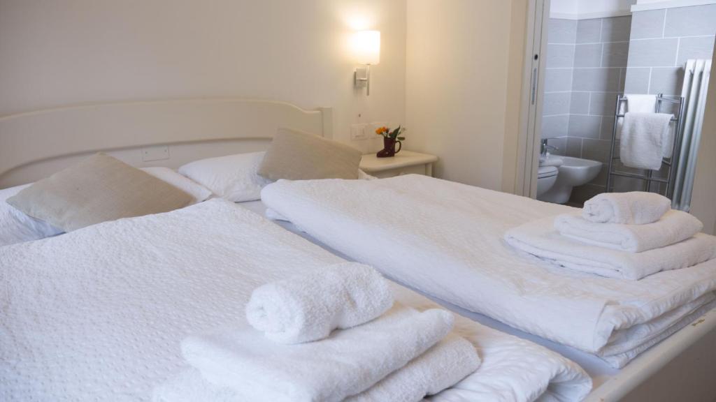 Postel nebo postele na pokoji v ubytování Hotel B&B Francolini