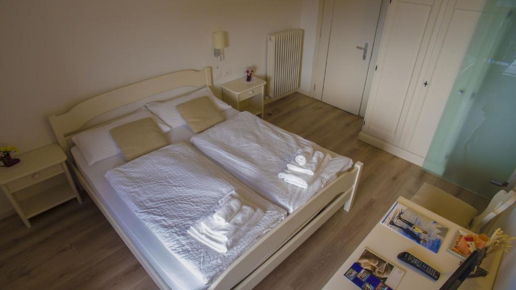 Postel nebo postele na pokoji v ubytování Hotel B&B Francolini