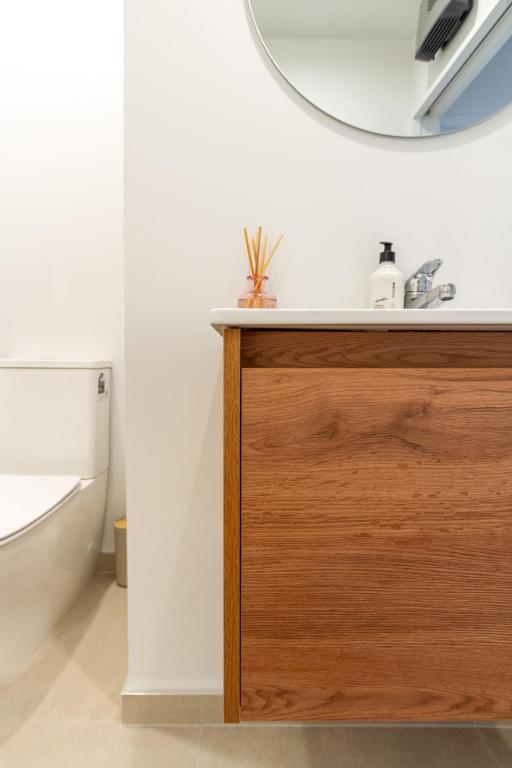 Bright & Spacious 2BR near Ara Institute and CBD - Resim 21