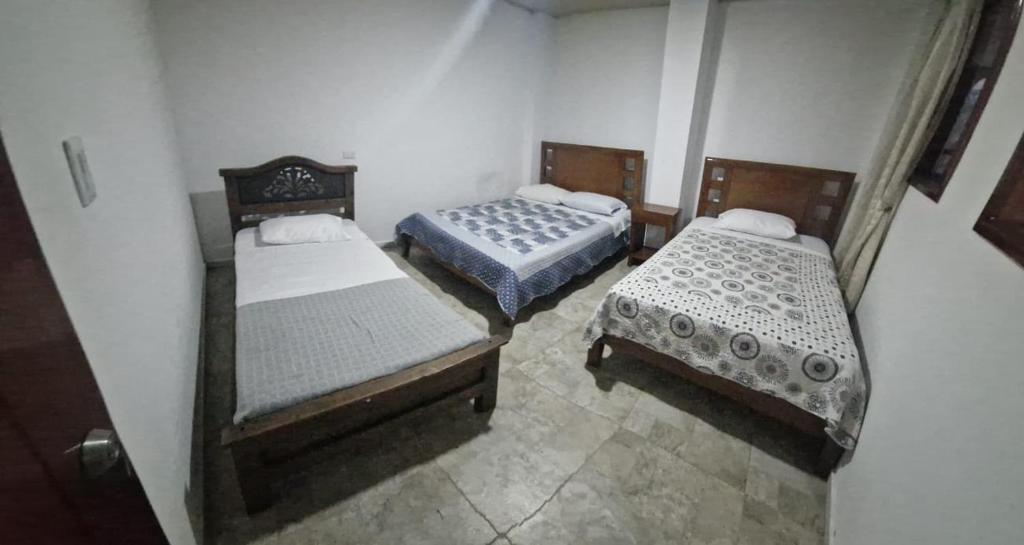 Postel nebo postele na pokoji v ubytování Hotel Finca los Cristales