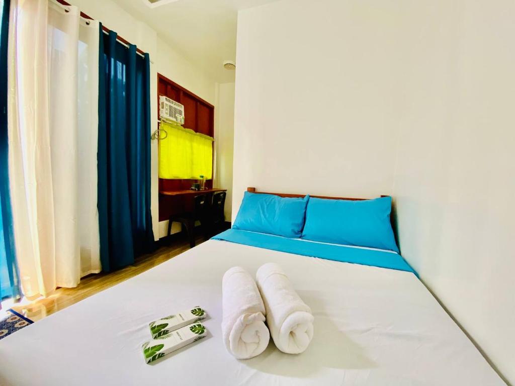 Voodi või voodid majutusasutuse Sudla Siargao Hostel toas