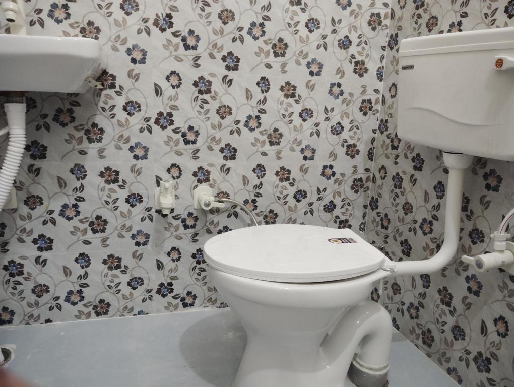 Koupelna v ubytování "Om Sadan" Guest House Ayodhya Dhaam