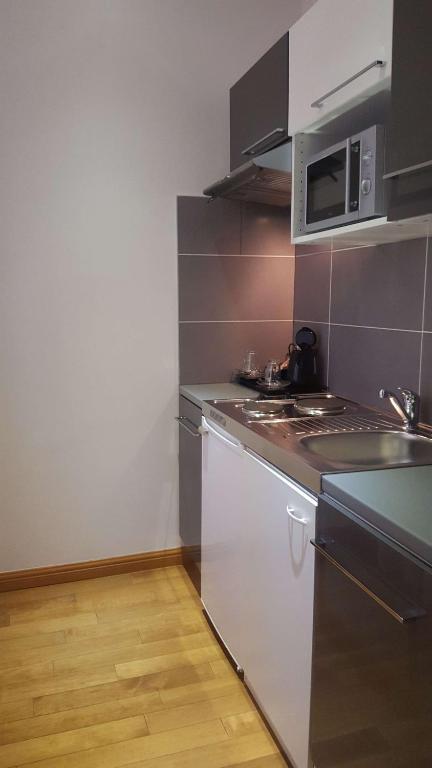 Kuchyň nebo kuchyňský kout v ubytování Best Western Plus Hotel Arcadia