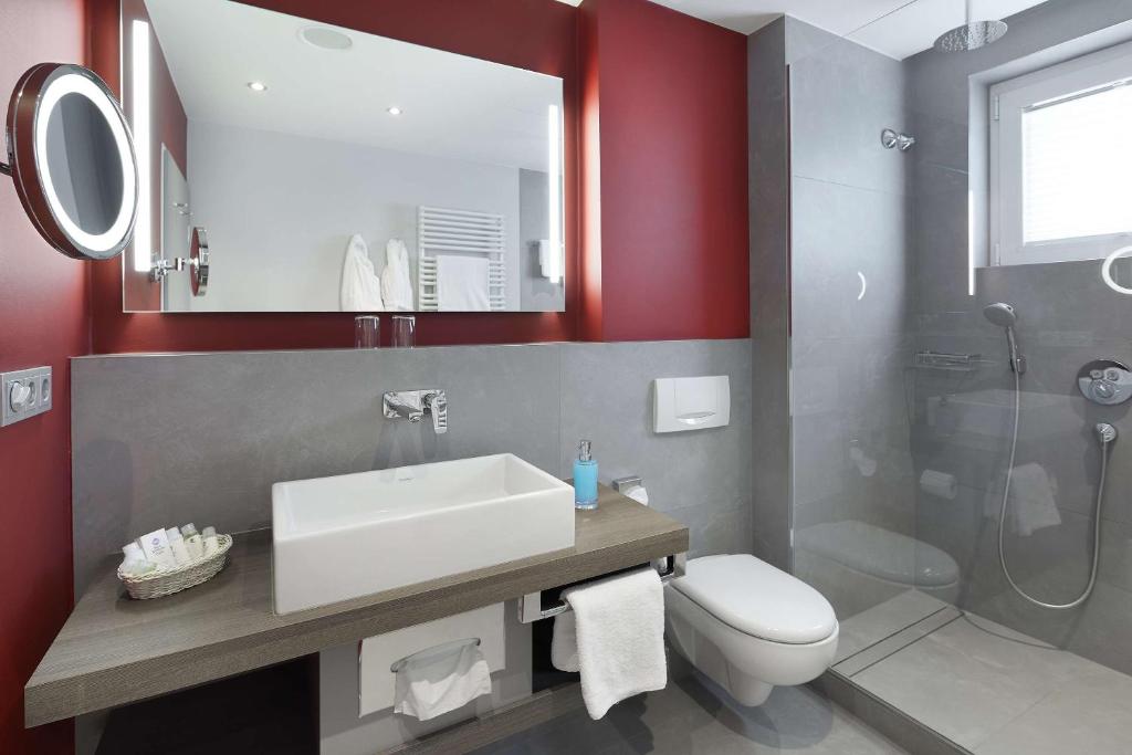 Koupelna v ubytování Best Western Plus Arosa Hotel