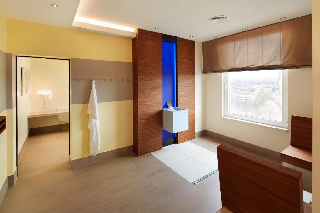 Postel nebo postele na pokoji v ubytování Best Western Plus Arosa Hotel