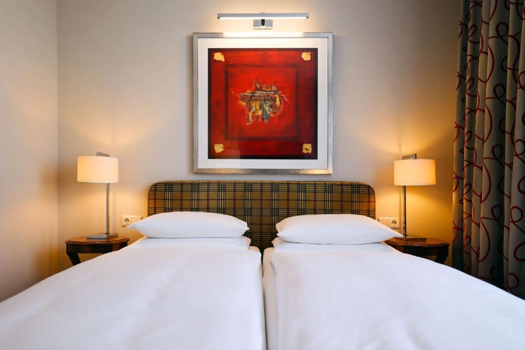 Postel nebo postele na pokoji v ubytování Best Western Plus Hotel St. Raphael
