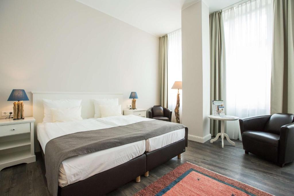 Postel nebo postele na pokoji v ubytování Best Western Plus Theodor Storm Hotel