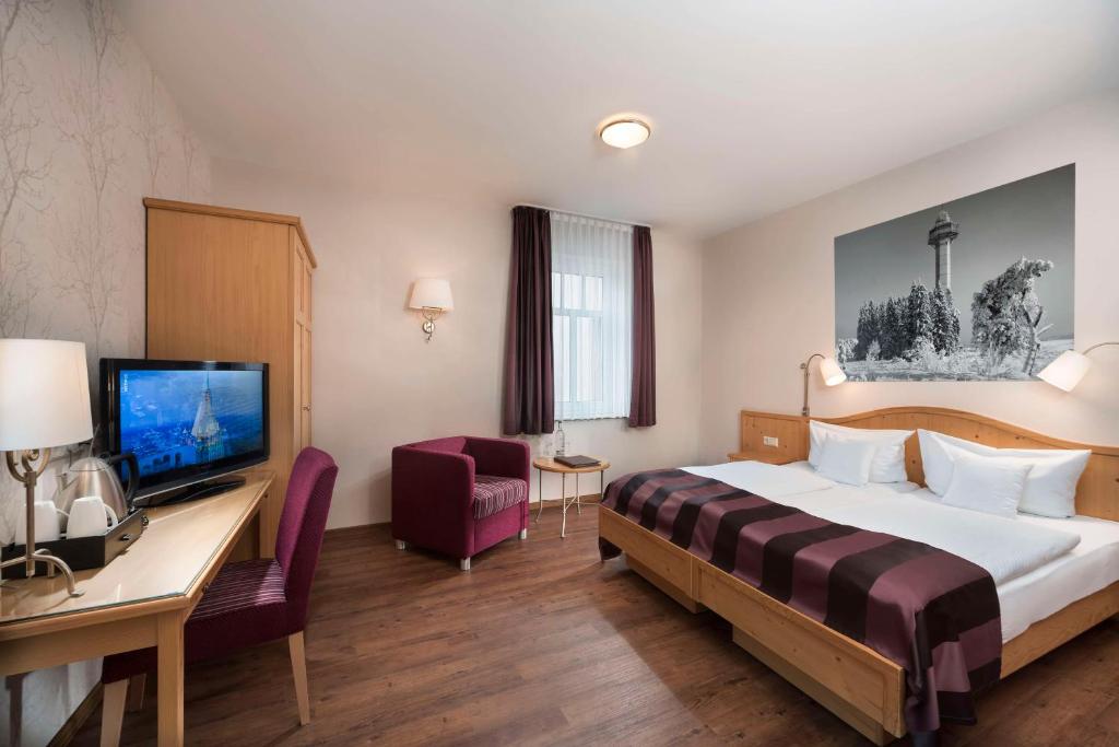 Postel nebo postele na pokoji v ubytování Best Western Plus Hotel Willingen