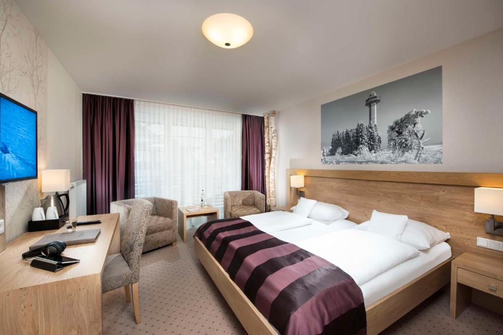 Postel nebo postele na pokoji v ubytování Best Western Plus Hotel Willingen