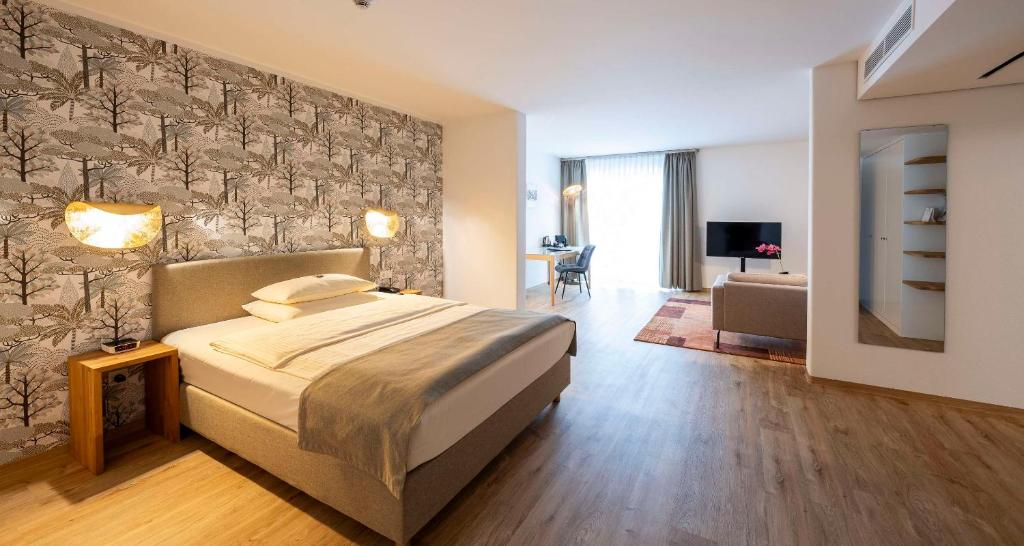 Postel nebo postele na pokoji v ubytování Best Western Plus iO Hotel