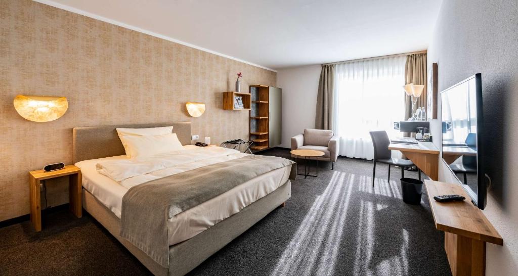 TV a/nebo společenská místnost v ubytování Best Western Plus iO Hotel