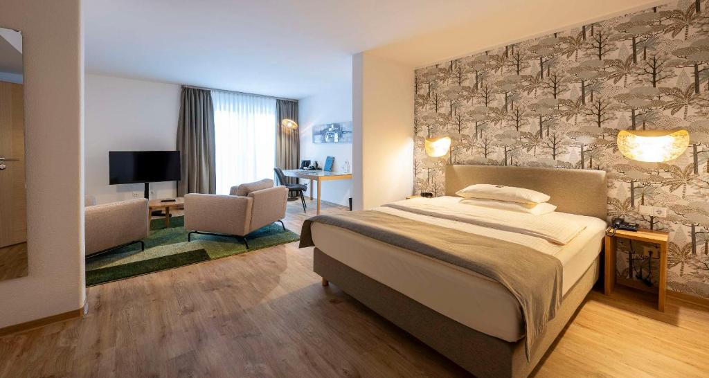 Postel nebo postele na pokoji v ubytování Best Western Plus iO Hotel