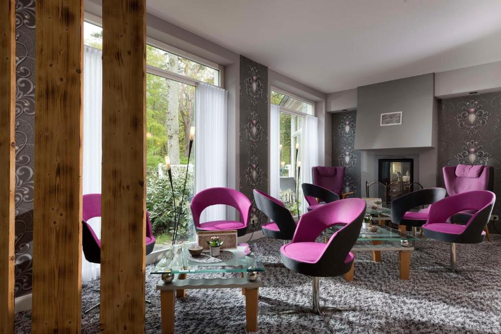 Posezení v ubytování Best Western Plus Ostseehotel Waldschloesschen