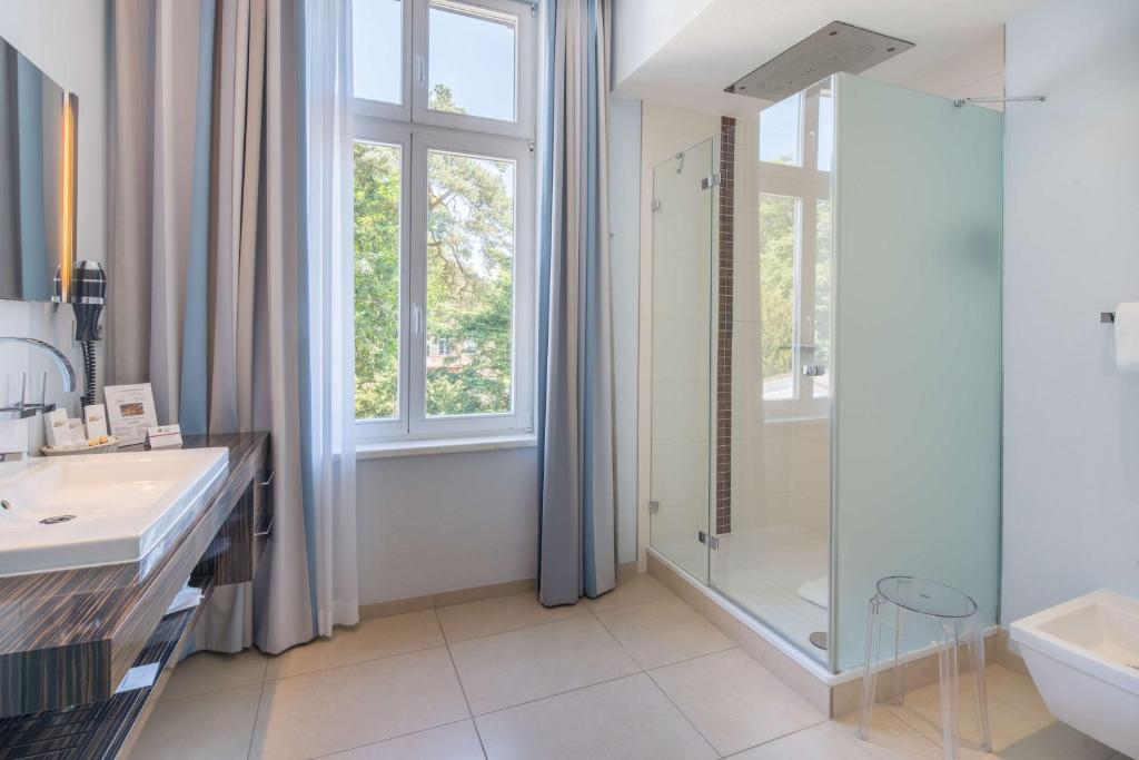 Koupelna v ubytování Best Western Plus Ostseehotel Waldschloesschen