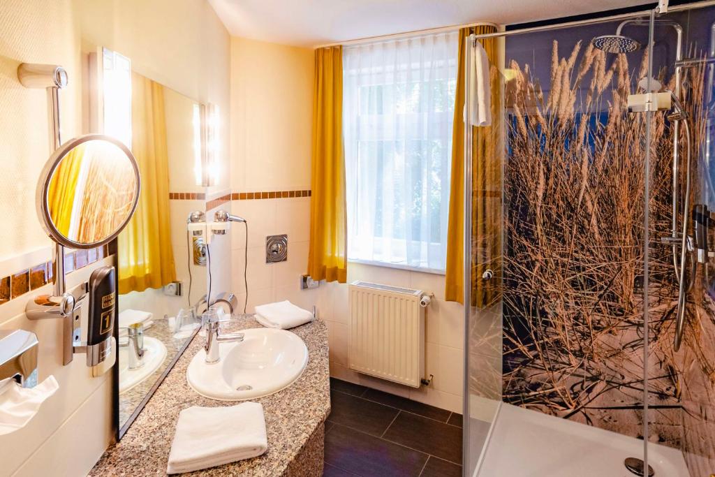 Koupelna v ubytování Best Western Plus Ostseehotel Waldschloesschen