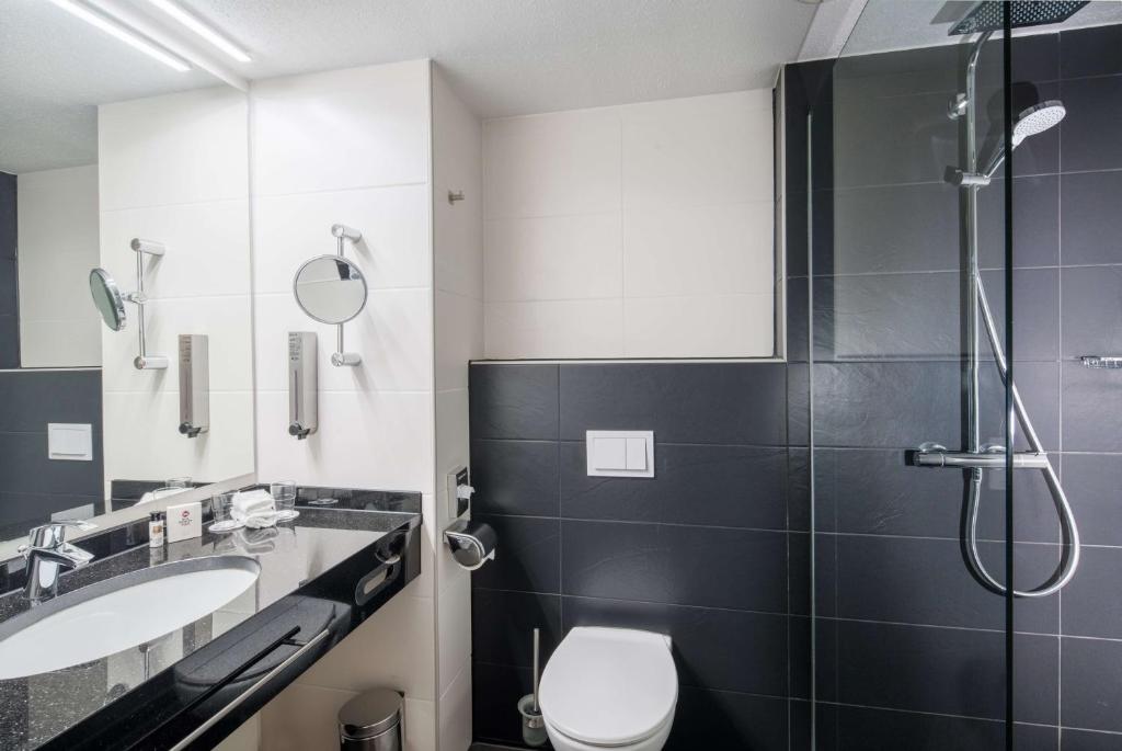 Koupelna v ubytování Best Western Plus Plaza Hotel Darmstadt