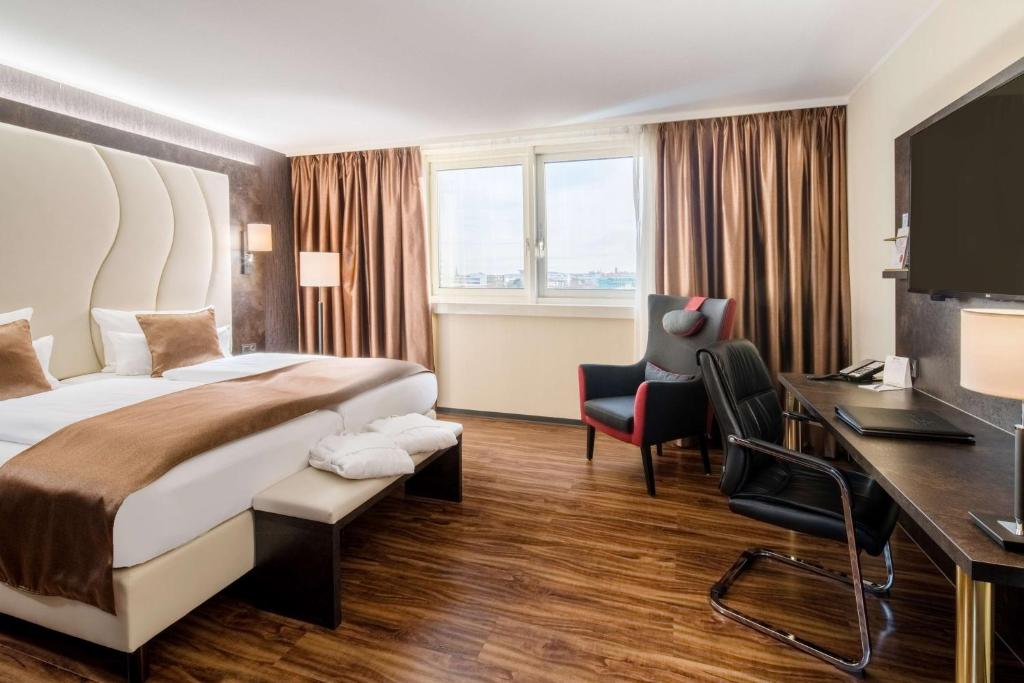 Postel nebo postele na pokoji v ubytování Best Western Plus Plaza Hotel Darmstadt