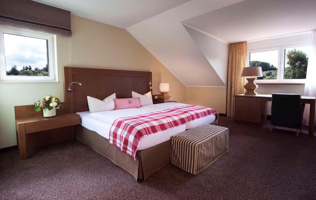 Postel nebo postele na pokoji v ubytování Best Western Hotel Brunnenhof
