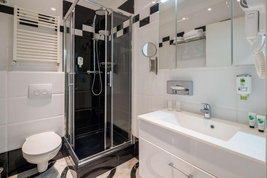 Kúpeľňa v ubytovaní Best Western Plus Celebrity Suites