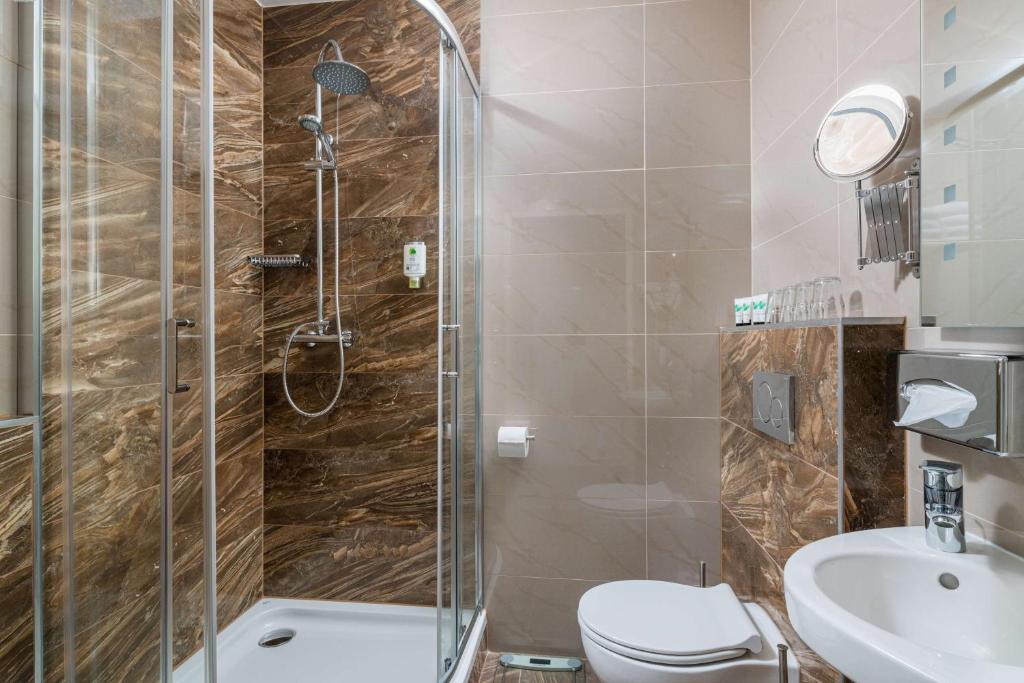 Kúpeľňa v ubytovaní Best Western Plus Celebrity Suites