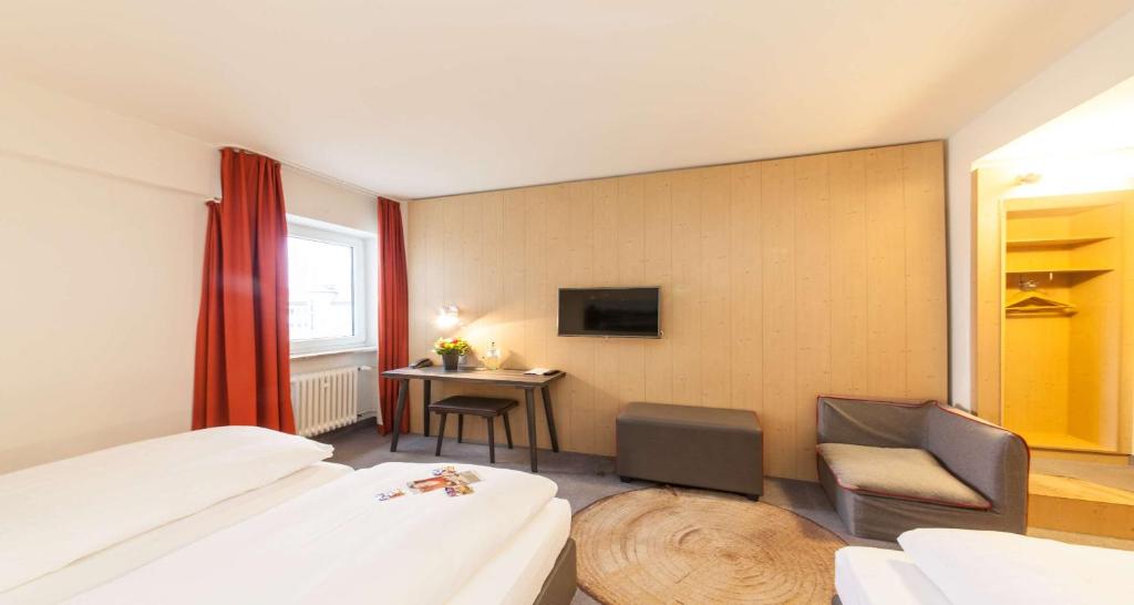Postel nebo postele na pokoji v ubytování Sure Hotel by Best Western Muenchen Hauptbahnhof