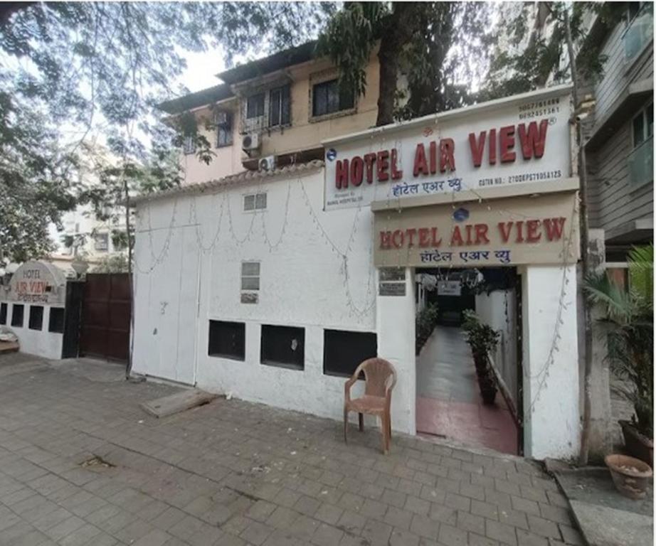 a building with a sign for a hotel air view at HOTEL AIR VIEW Near Airport in Mumbai