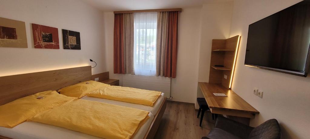 Postel nebo postele na pokoji v ubytování Gasthof Schauer