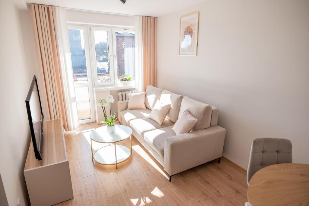 Χώρος καθιστικού στο Jasna Przystań