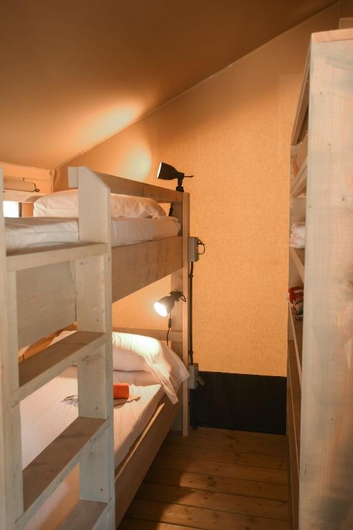 Postel nebo postele na pokoji v ubytování Casa Mobile - Spiaggia e Mare Holiday Park